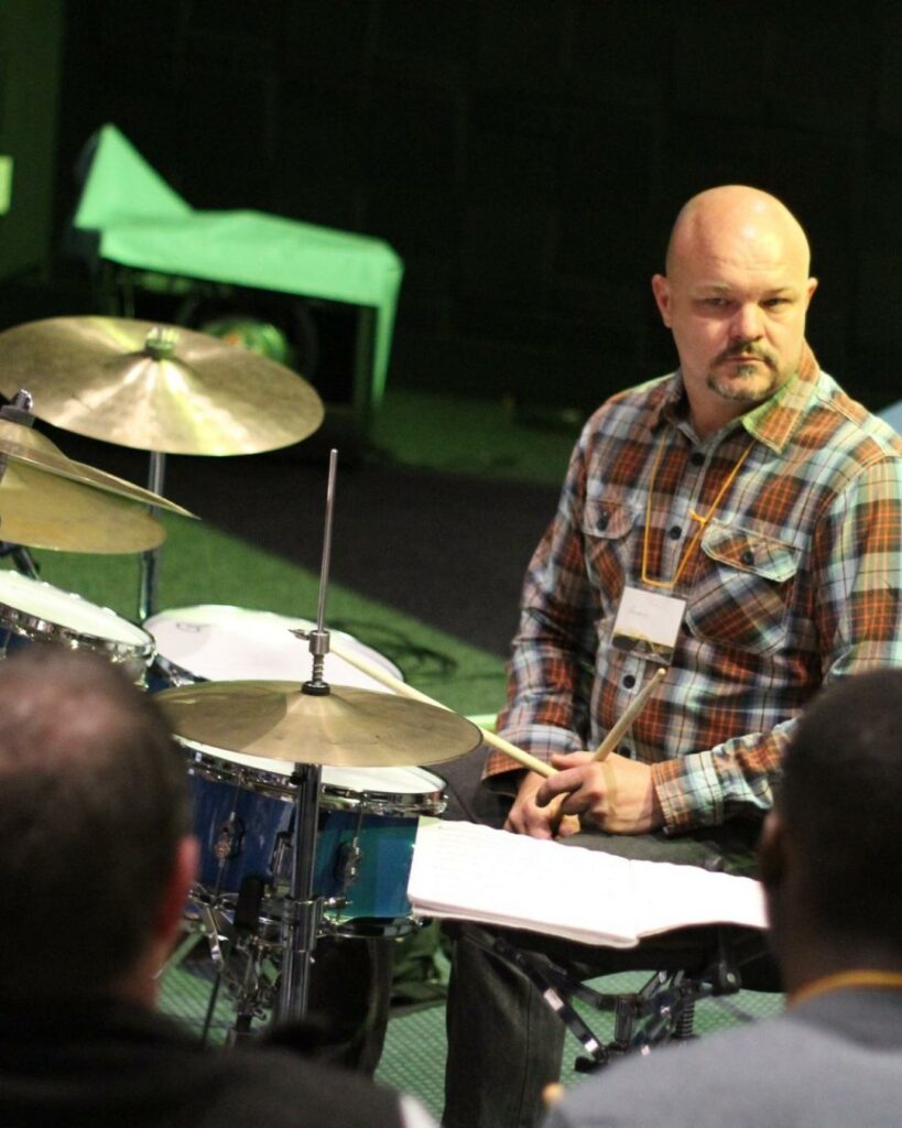 Andries Visser teaching drums at Groove Regulators SA